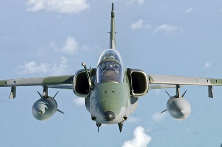 Brazilian Air Force Embraer A-1B soars through the sky over Brazil by Giovanni Colla/Stocktrek Images art print