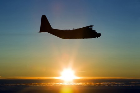 Silhouette of a MC-130H Combat Talon at Sunset, East Anglia, UK by Gert Kromhout/Stocktrek Images art print