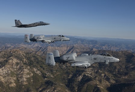 F-15 Eagle and Two A-10 Thunderbolts, Central Idaho by HIGH-G Productions/Stocktrek Images art print