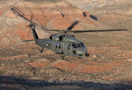 HH-60G Pave Hawk Flies a Low Level Route in New Mexico Mountains by HIGH-G Productions/Stocktrek Images art print