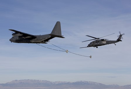 HH-60G Pave Hawk Prepares  for Aerial Refueling from an HC-130 by HIGH-G Productions/Stocktrek Images art print