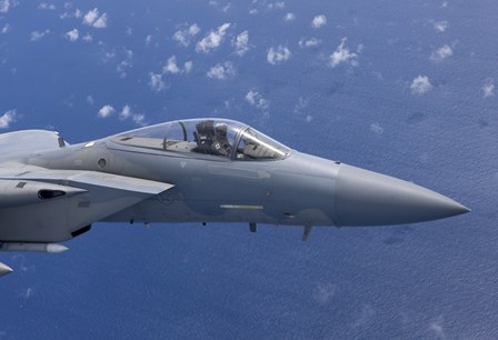 F-15 Eagle Flies over the Pacific Ocean by HIGH-G Productions/Stocktrek Images art print