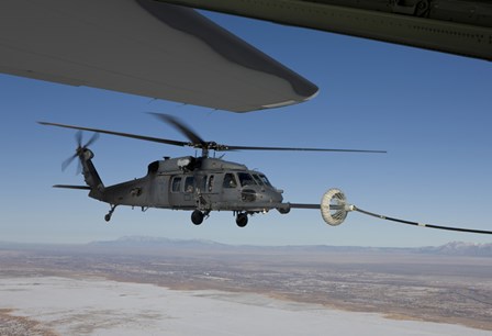 HH-60G Pave Hawk Conducts Aerial Refueling from an HC-130 by HIGH-G Productions/Stocktrek Images art print