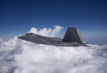 An F-22 Raptor over New Mexico by HIGH-G Productions/Stocktrek Images art print