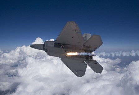 An F-22 Raptor Releases a Flare by HIGH-G Productions/Stocktrek Images art print
