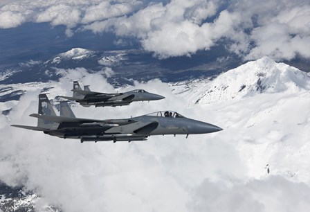 Two F-15 Eagles Fly Past Snow Capped Peaks in Central Oregon by HIGH-G Productions/Stocktrek Images art print
