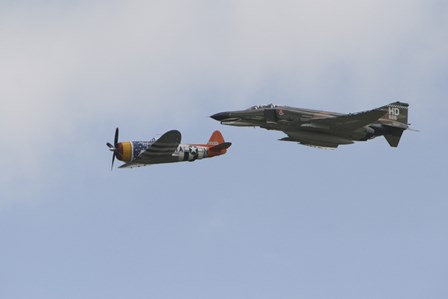 A P-47 Thunderbolt and an F-4 Phantom in Flight by Terry Moore/Stocktrek Images art print