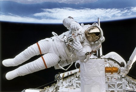 Astronaut Participates in Extravehicular Activity 1 by Stocktrek Images art print