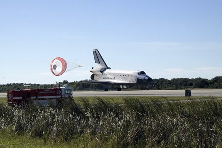 Space Shuttle Atlantis Unfurls its Drag Chute upon Landing at Kennedy Space Center, Florida by Stocktrek Images art print