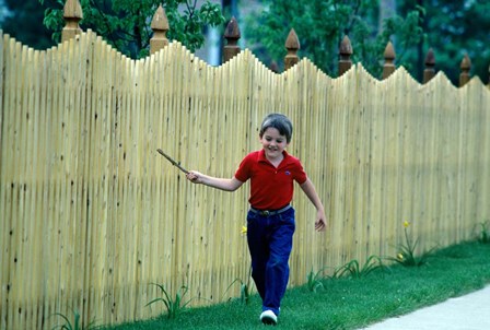 1980s Smiling Boy Running Along Sidewalk by Vintage PI art print